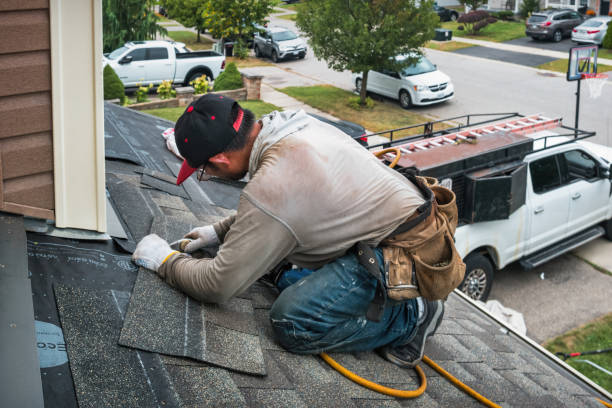 Professional Roofing technician working in Rexburg, ID
